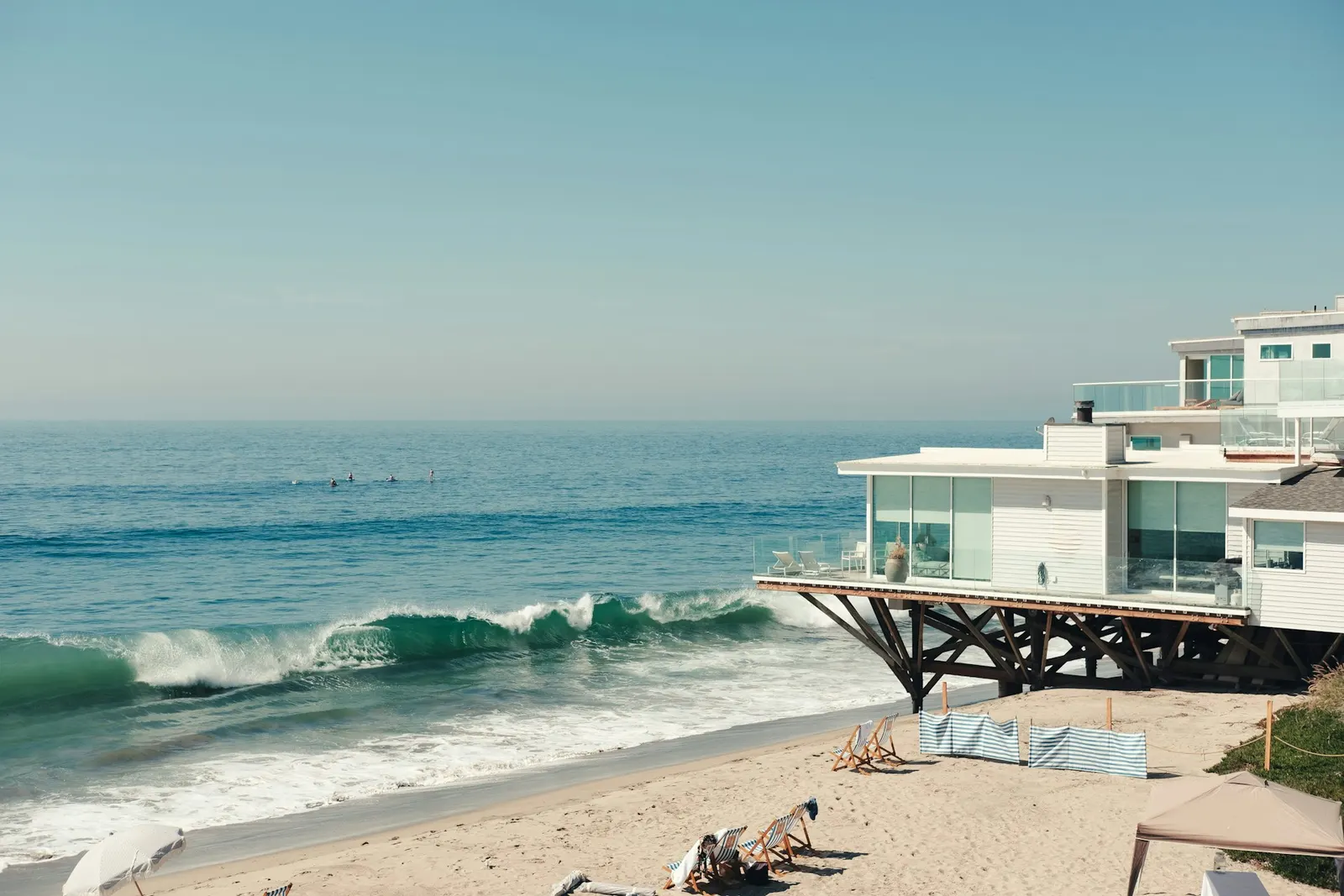 Oceanfront home on a pier above breaking waves on the Treasure Coast